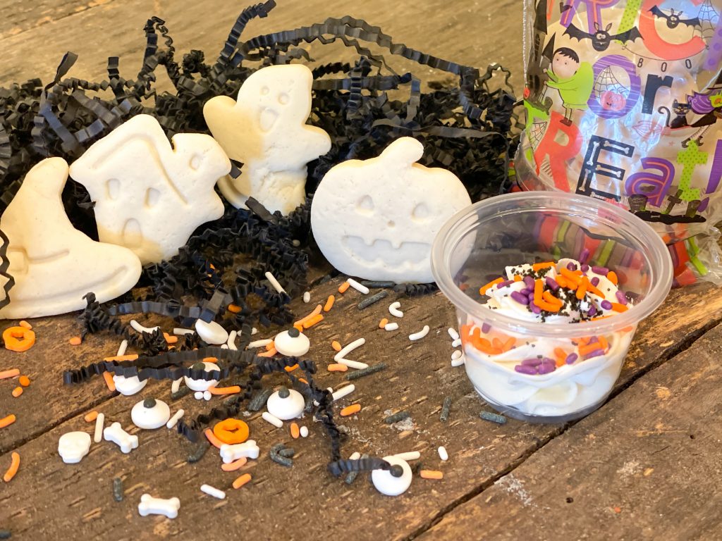 Halloween Sugar Cookie Dippers from Farmwife Feeds. A super easy fun treat for parties, classrooms or a treat for the family. Easy to use plunge cookie cutters and basic buttercream. #halloween #treats #cookiedippers