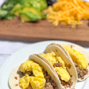 Simple Breakfast Tacos from Farmwife Feeds. Breakfast Burritos unwrapped are a great meal any time of the day with salsa, avacado and cilantro for a fresh meal in under 30 minutes. #taco #breakfastburrrito