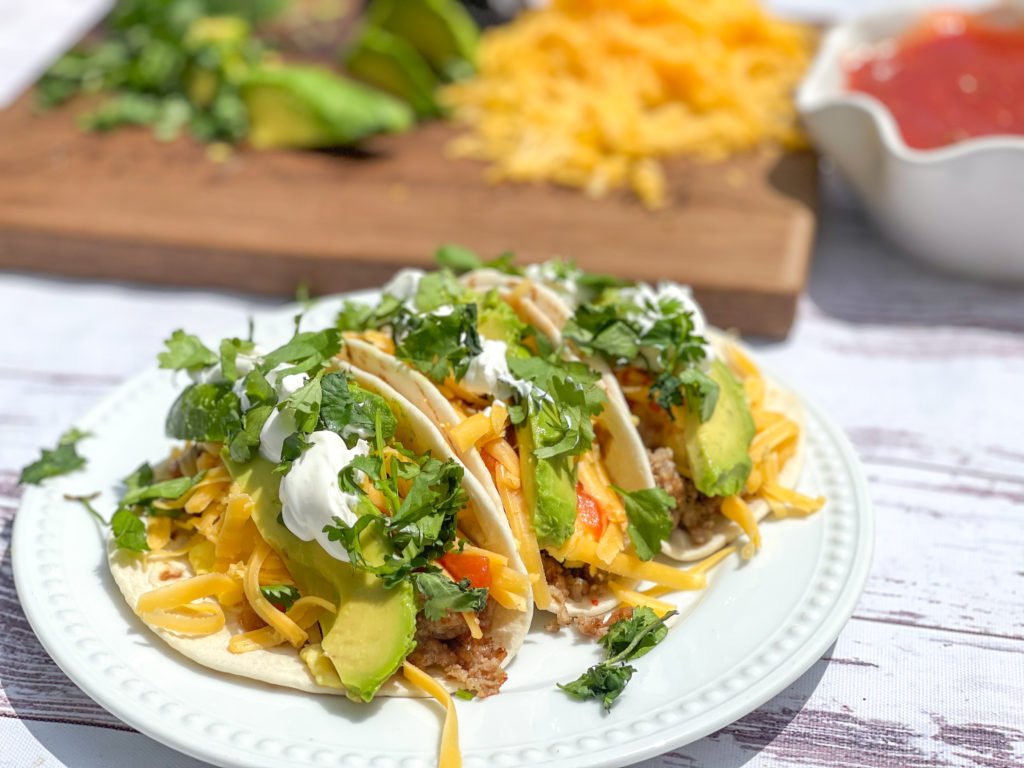 Simple Breakfast Tacos from Farmwife Feeds. Breakfast Burritos unwrapped are a great meal any time of the day with salsa, avacado and cilantro for a fresh meal in under 30 minutes. #taco #breakfastburrrito