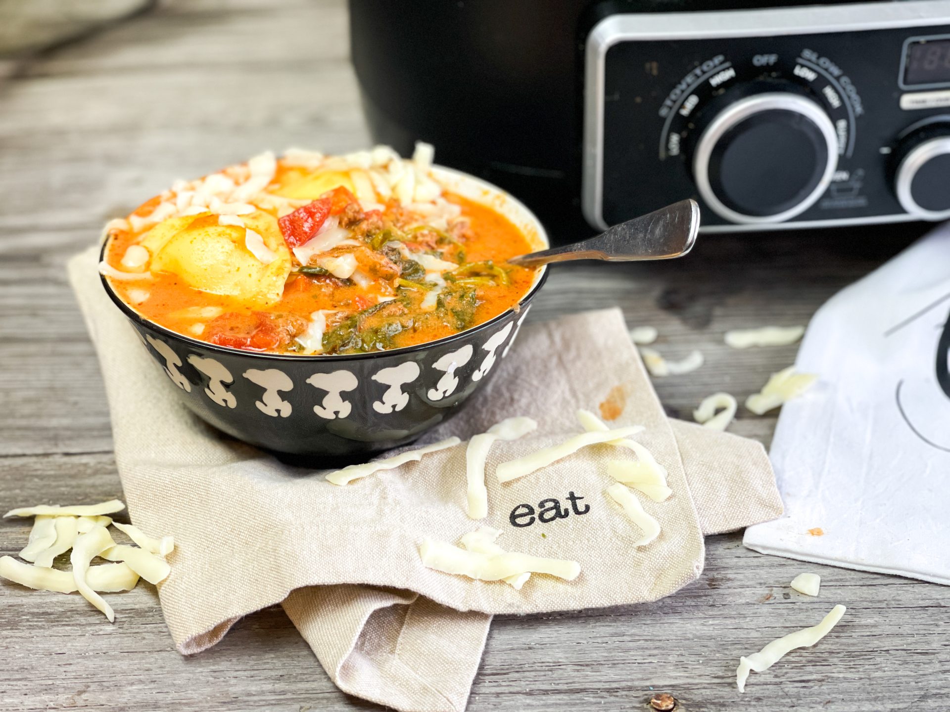 Easy Crockpot Sausage Ravioli Soup from Farmwife Feeds - a slow cooker hearty soup full of flavor, classic lasagna flavors in a warm bowl. #soup #crockpot #slowcooker #ravioli