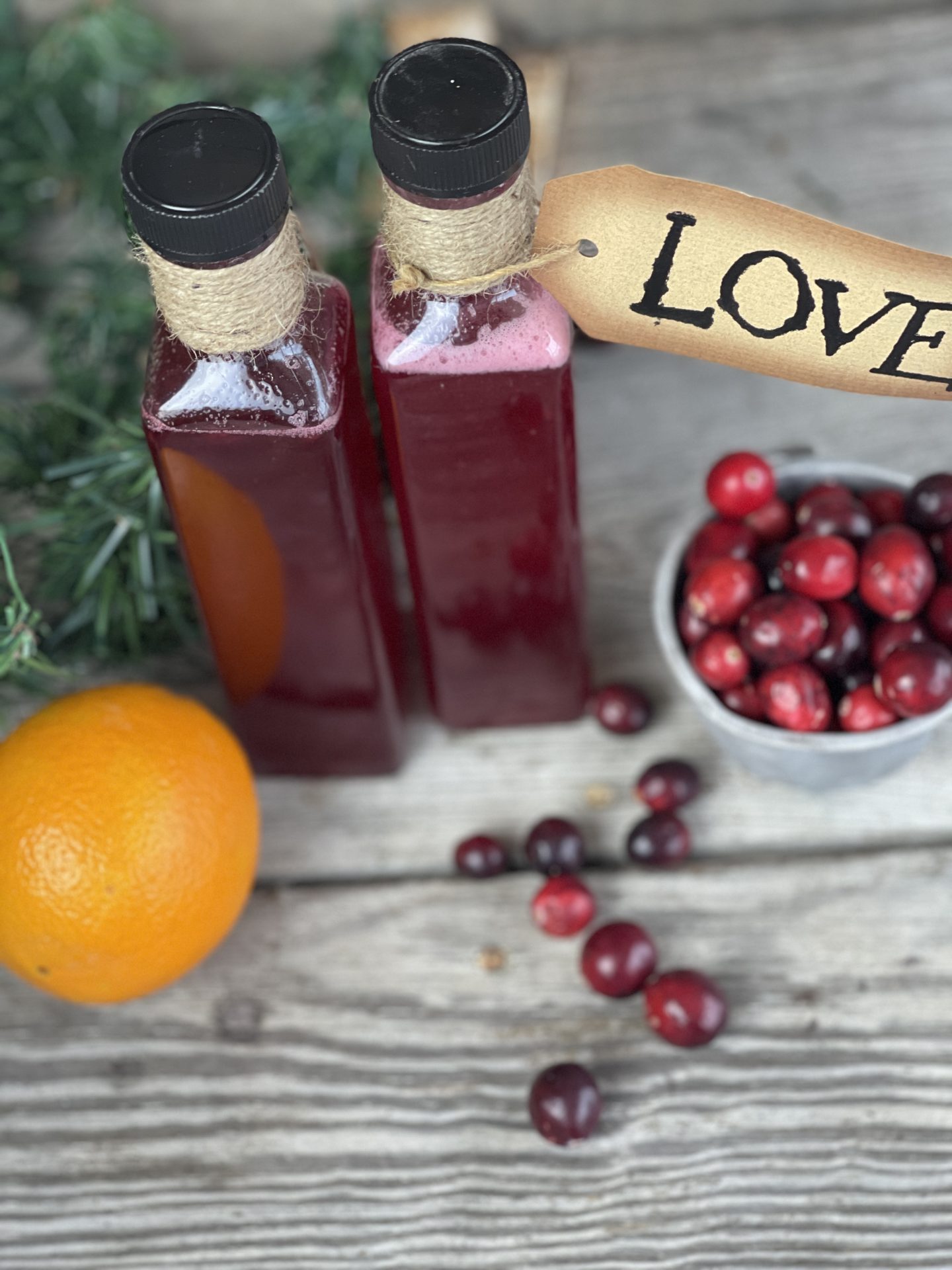 Easy Homemade Cranberry Simply Syrup from Farmwife Feeds, 3 ingredients make a great hostess gift or a holiday treat in cocktails, coffee and hot chocolate. #simplesyrup #cocktails #cranberry