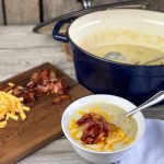 Creamy Corn Chowder from Farmwife Feeds. A hearty and filling meal with bacon and cheese for an ultimate comfort food. #chowder #corn #bacon #soup