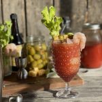 Classic Bloody Mary Cocktail from Farmwife Feeds. Spicy and full of deep flavors made with my homemade dry spice mix and vodka marinated olives make this classic drink a crowd pleaser. #vodka #tomato #bloodymary #cocktail