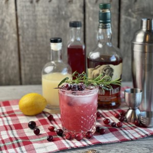 Cranberry Whiskey Sour from Farmwife Feeds. A festive twist on a classic cocktail, perfect during the holiday season. #whiskeysour #cranberry #cocktail #holidaydrink