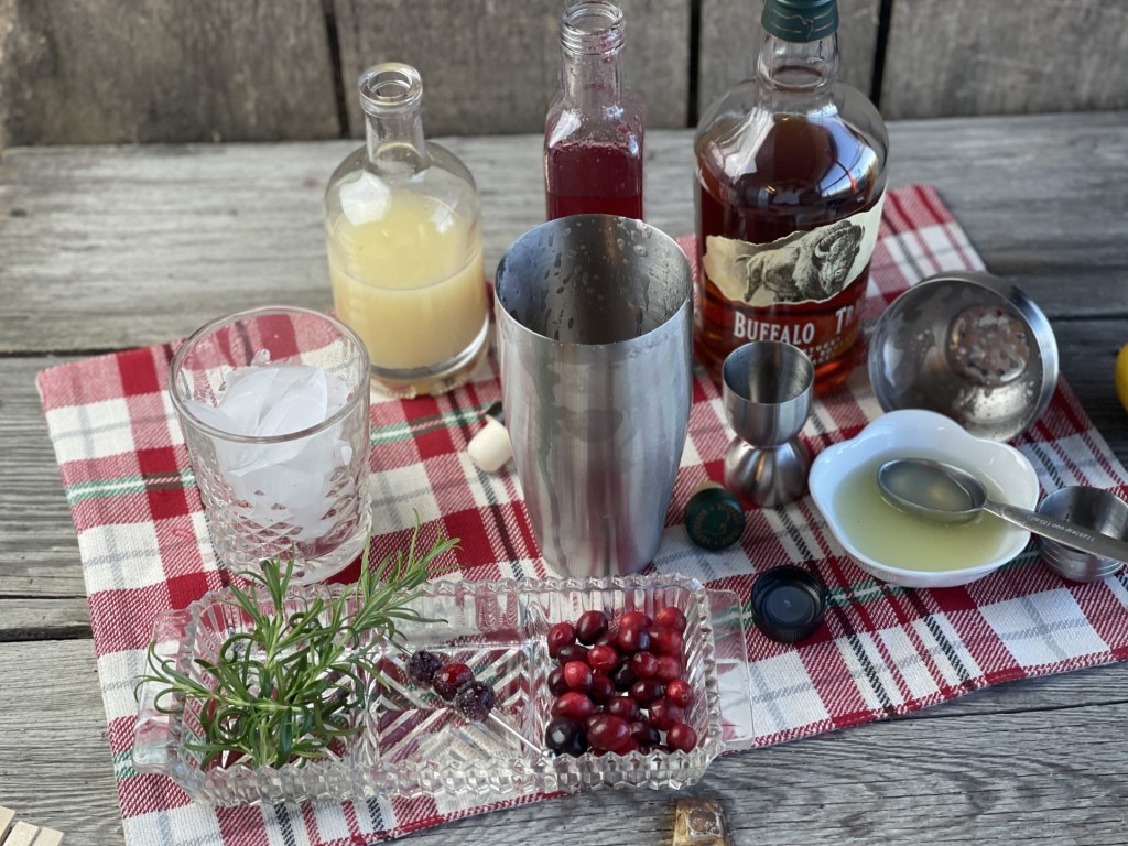 Cranberry Whiskey Sour from Farmwife Feeds. A festive twist on a classic cocktail, perfect during the holiday season. #whiskeysour #cranberry #cocktail #holidaydrink