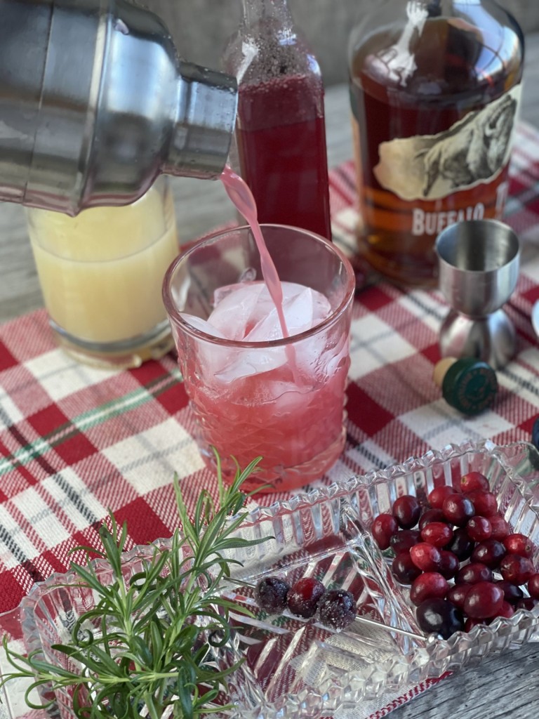 Cranberry Whiskey Sour from Farmwife Feeds. A festive twist on a classic cocktail, perfect during the holiday season. #whiskeysour #cranberry #cocktail #holidaydrink